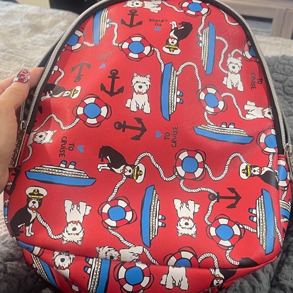 Marc Tetro Red Cosmetic Bag with Playful Dog Design - Picture 2 of 5